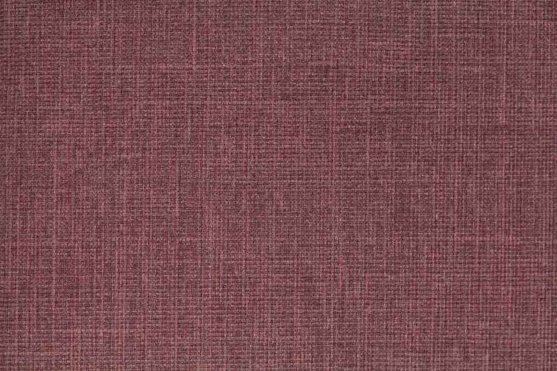 Muster in Burgunderrot mit feiner, strukturierter Oberfläche. Ideal für Polster- und Dekorationsprojekte.