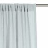 Halbtransparente blaue Gardine mit Falten, geeignet für eine stilvolle Raumgestaltung.