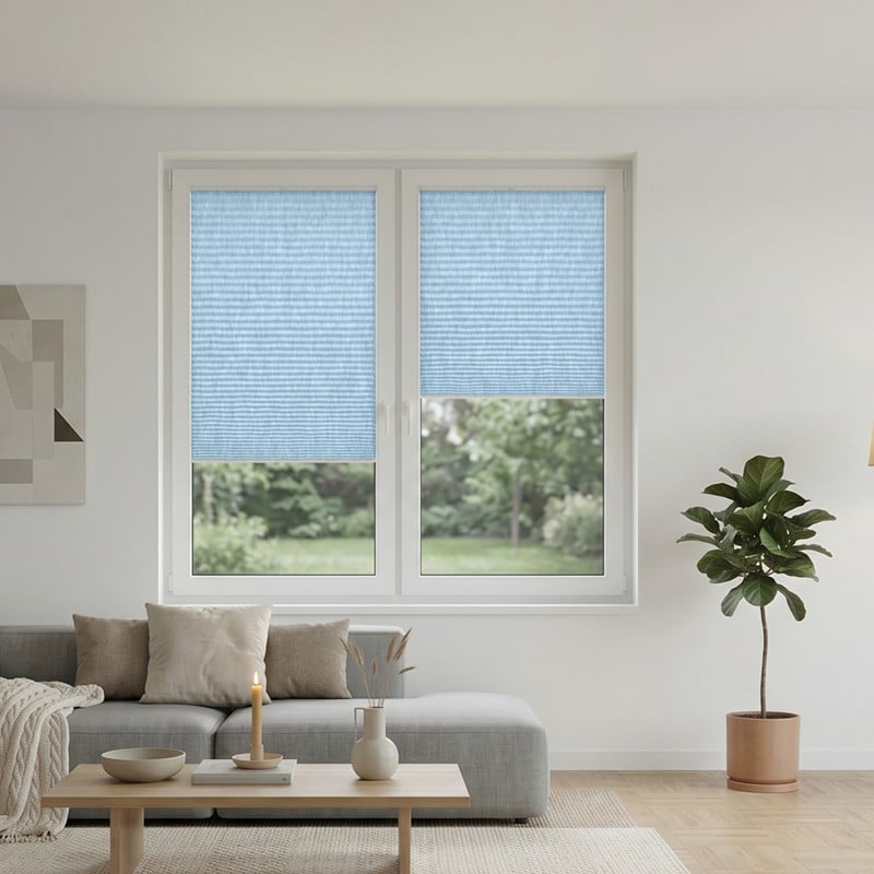 Crush-Pearl-Plissee der Comfort Line am Fenster